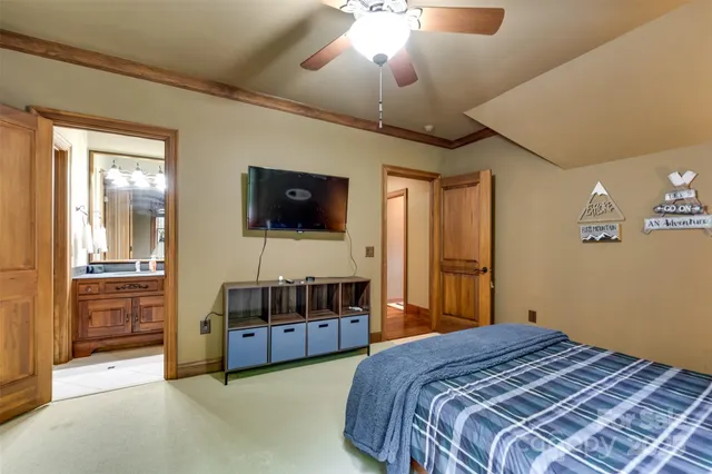 a bedroom with a bed and a walk in closet