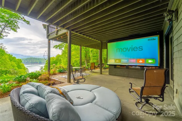 a view of a patio with a table chairs and a patio