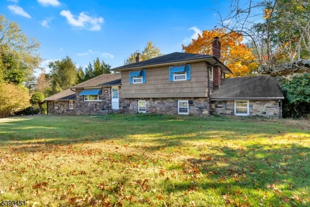 a view of a house with a swimming pool