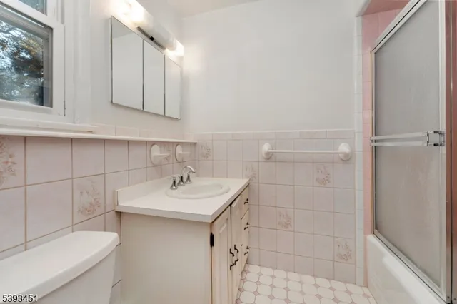 a view of a balcony with wooden floor