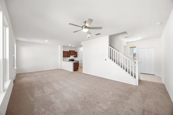 a view of a livingroom with a ceiling fan