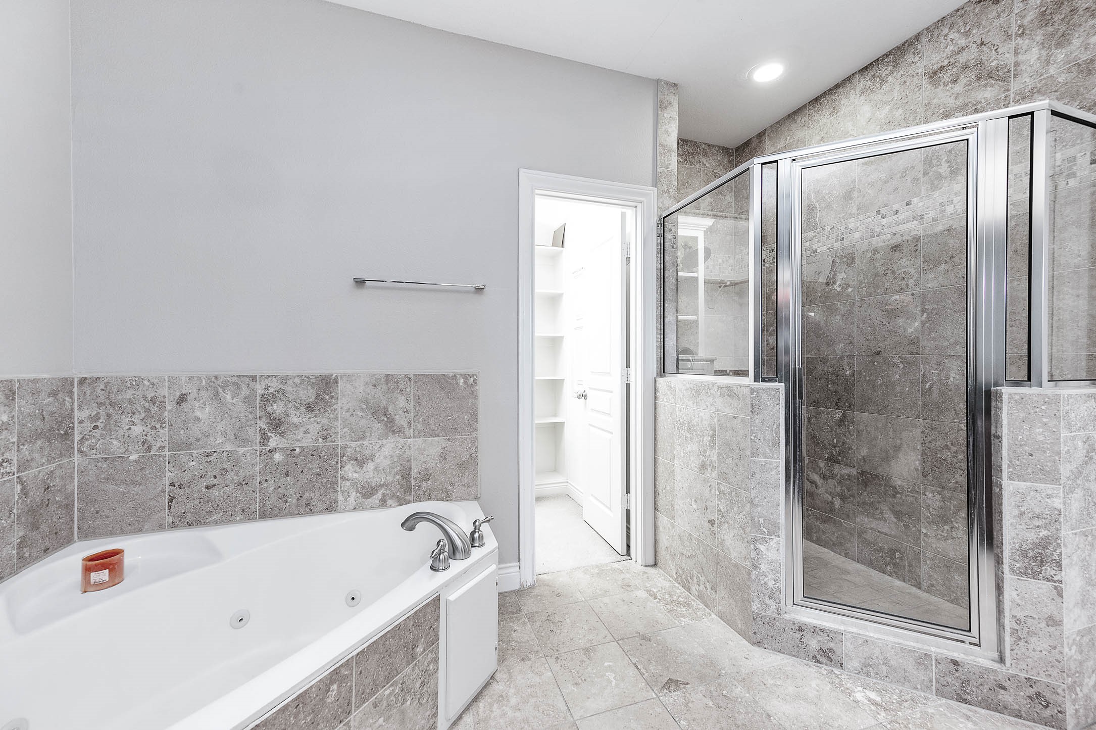2503 Dallas Street Houston, TX 77003 - Photo 25 of 30 a bathroom with a bathtub and a shower