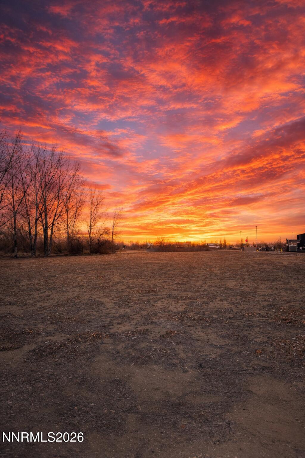 Sunset over vacant land stretch