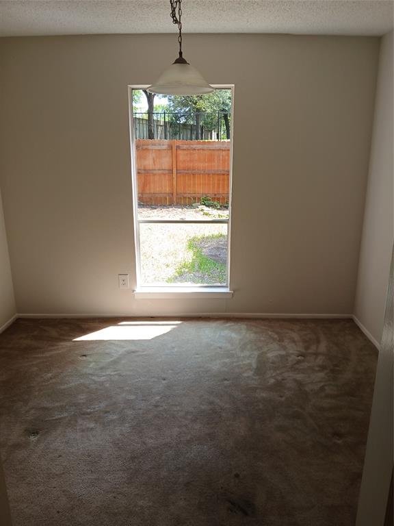 7456 East Northwest Highway, Unit H 125 Dallas, TX 75231 - Photo 9 of 10 an empty room with a window