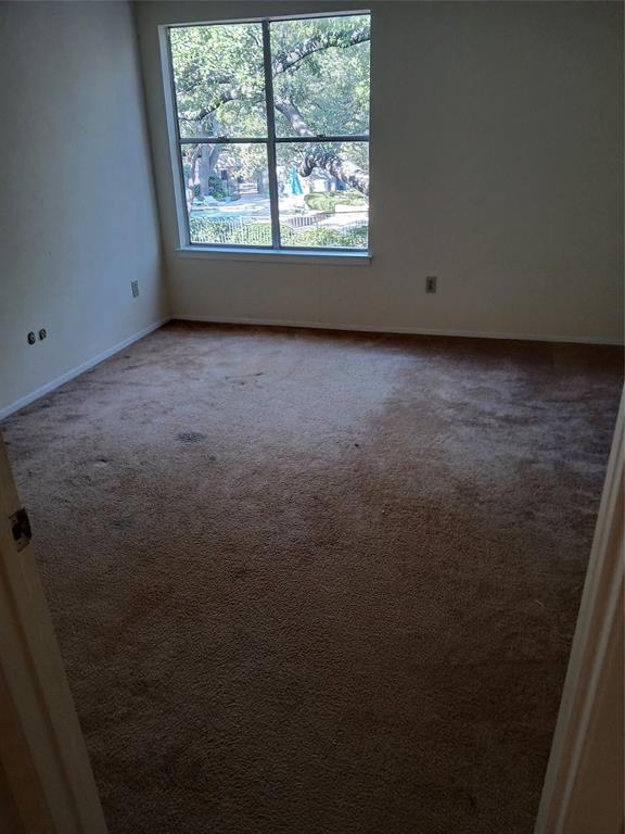 7456 East Northwest Highway, Unit H 125 Dallas, TX 75231 - Photo 10 of 10 an empty room with windows