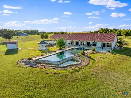 a view of a lake with a house