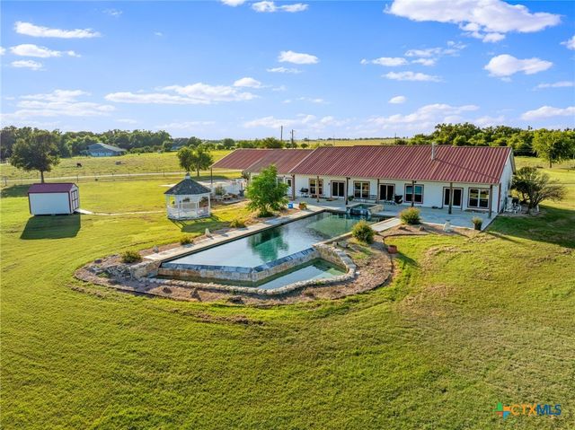 a view of a lake with a house