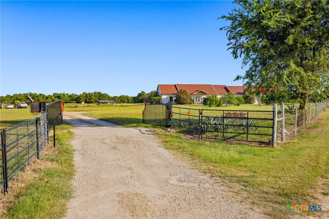 19587 Vilas Road Holland, TX 76534 - Photo 7 of 32 a view of a lake with a beach