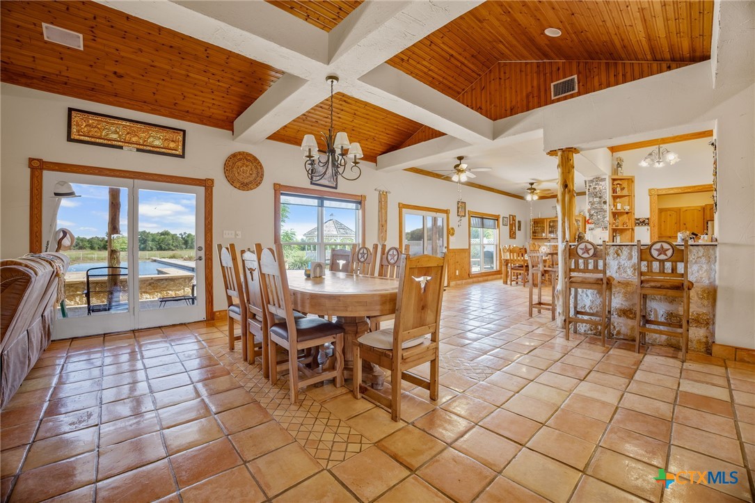 19587 Vilas Road Holland, TX 76534 - Photo 10 of 32 a view of a dining hall with lots of tables and chairs