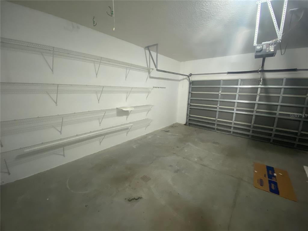 2409 Spring Hollow Loop Wesley Chapel, FL 33544 - Photo 25 of 47 a view of an empty storage area