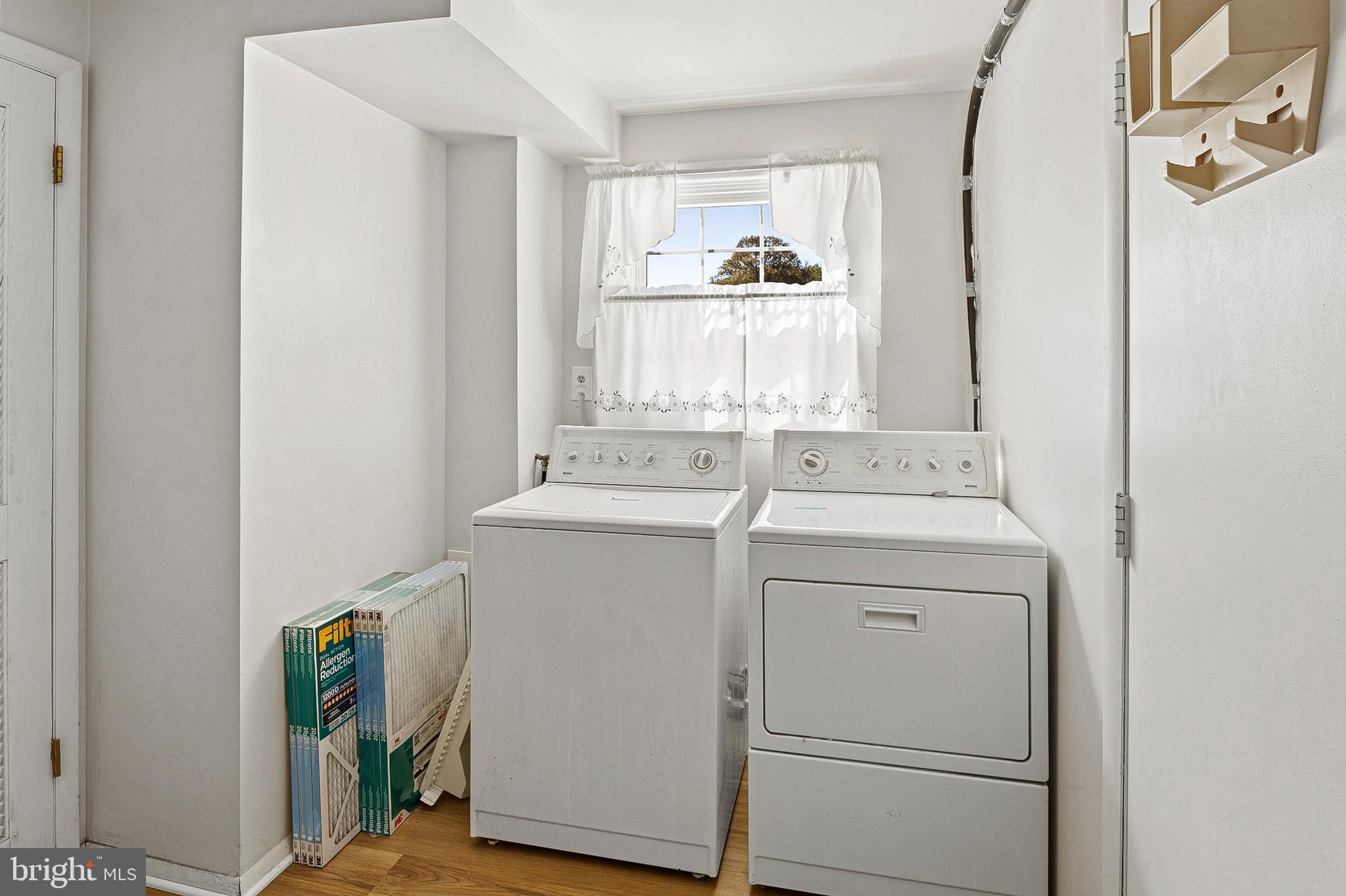 982 Fall Cir Way Gambrills, MD 21054 - Photo 26 of 32 a utility room with dryer and washer