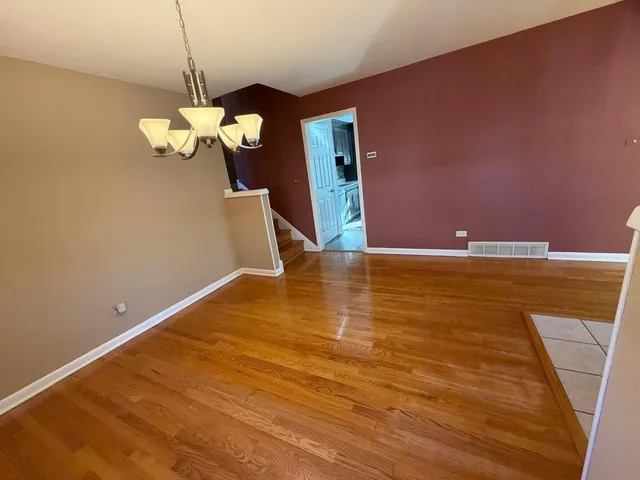 a view of a room with a chandelier