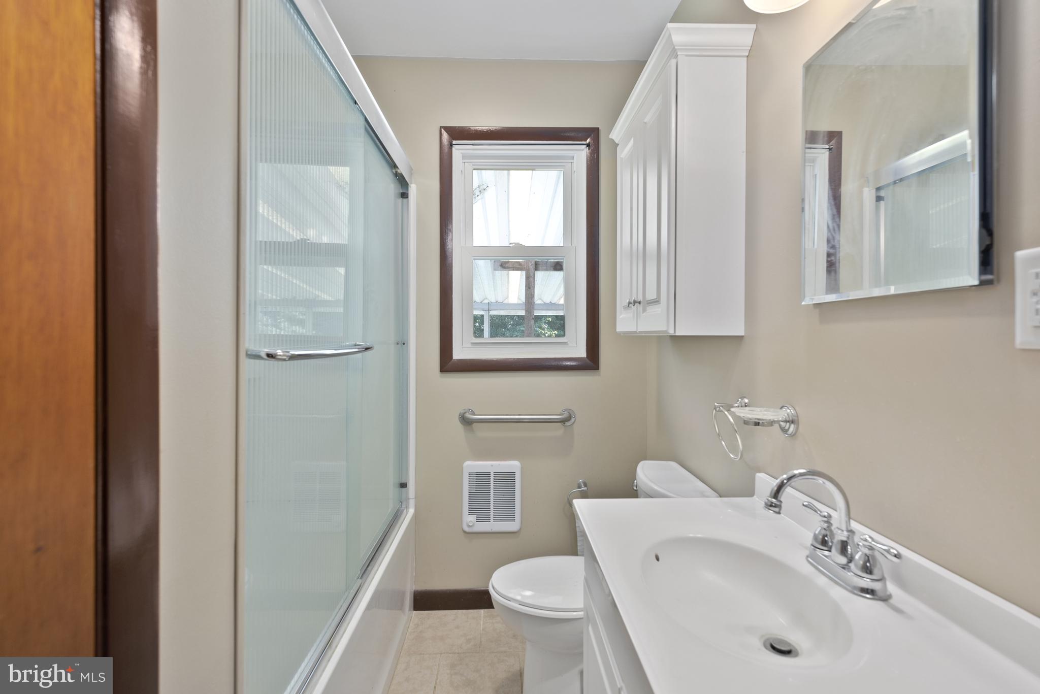380 Harrisville Road Colora, MD 21917 - Photo 14 of 22 a bathroom with a toilet sink and mirror