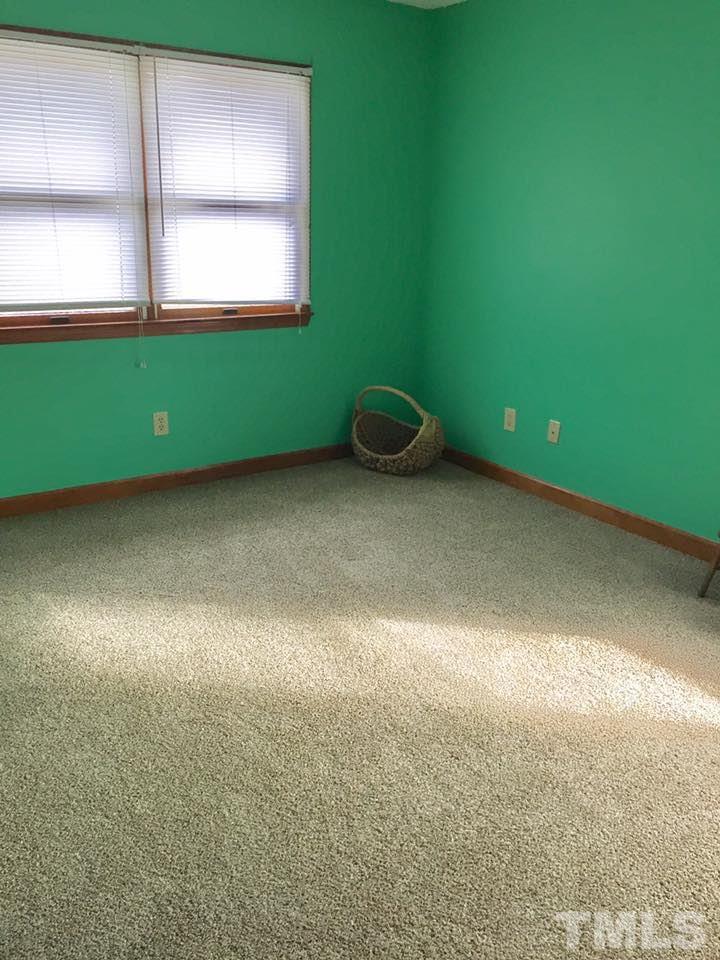 529 Noah Davis Road Roxboro, NC 27574 - Photo 18 of 25 a view of an empty room with a window