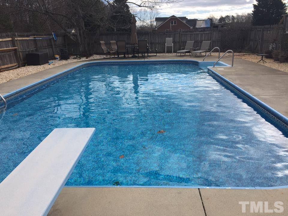 529 Noah Davis Road Roxboro, NC 27574 - Photo 3 of 25 a view of swimming pool with outdoor seating and plants