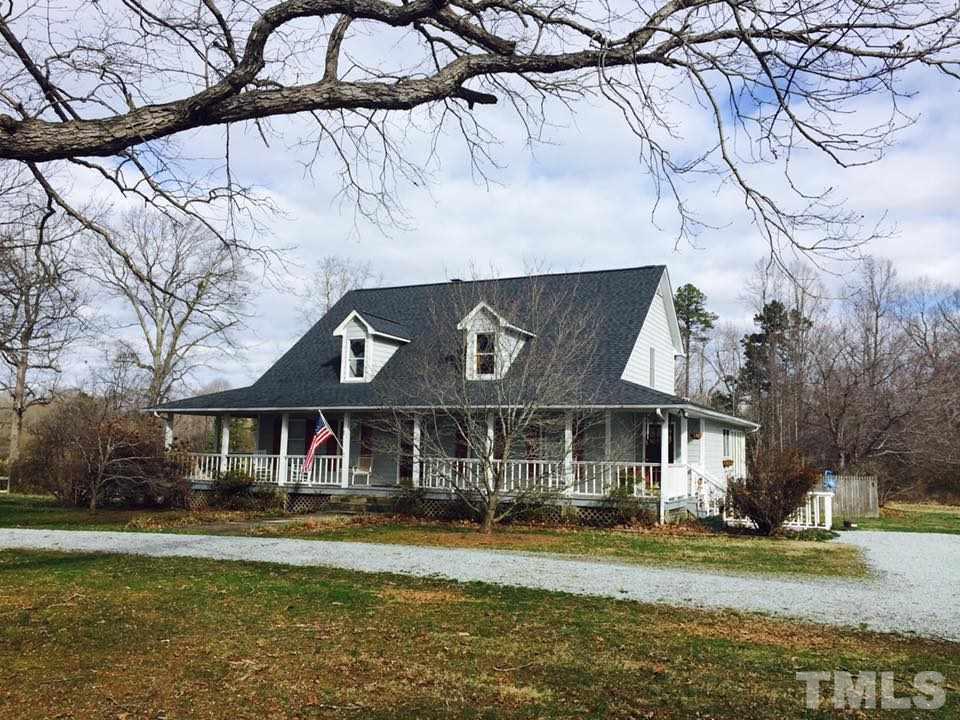 529 Noah Davis Road Roxboro, NC 27574 - Photo 24 of 25 a front view of a house with a yard