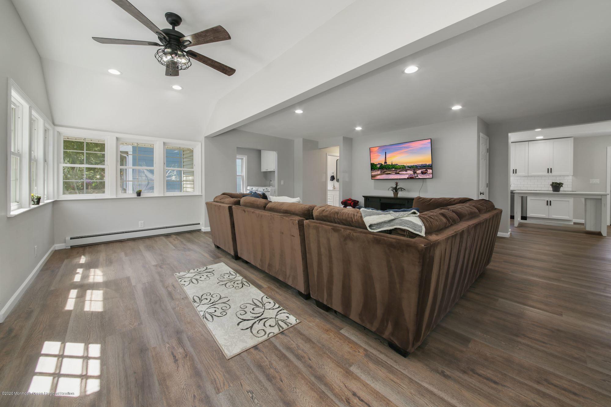 8 Unity Drive Brick, NJ 08723 - Photo 5 of 22 a living room with furniture and a wooden floor