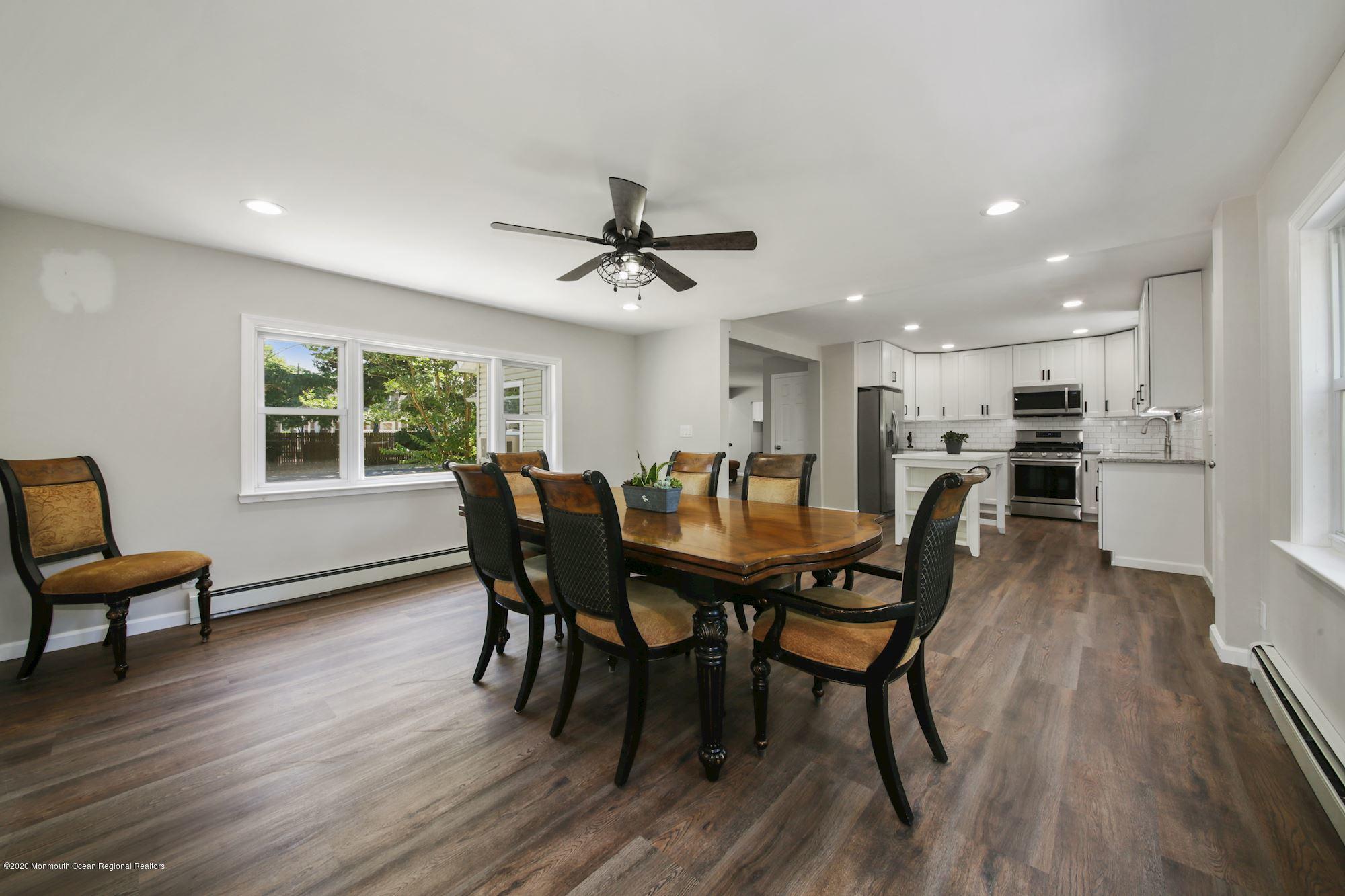 8 Unity Drive Brick, NJ 08723 - Photo 9 of 22 a view of a dining room with furniture and wooden floor