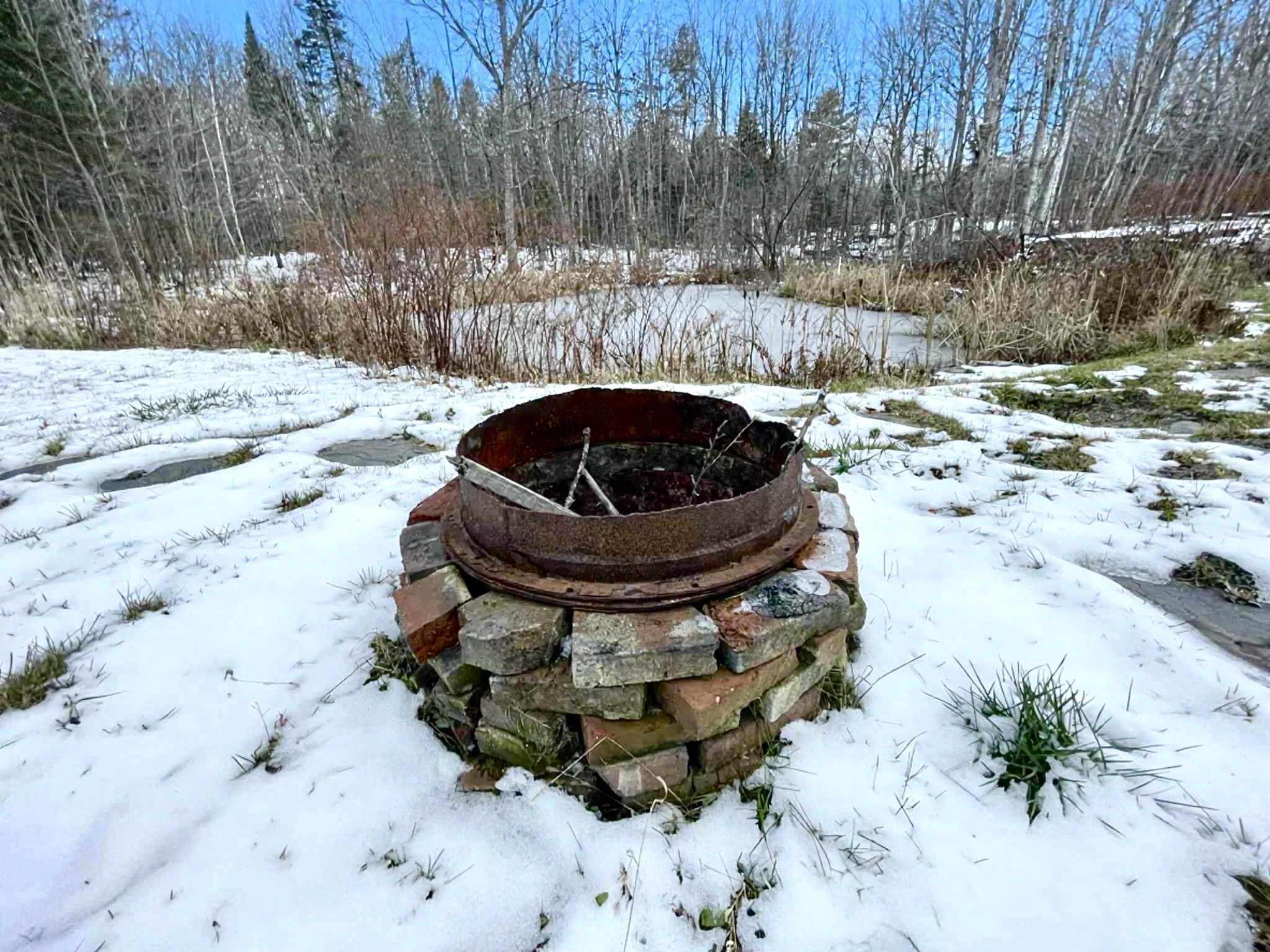 728 Sebec Village Road Sebec, ME 04481 - Photo 48 of 55 firepit
