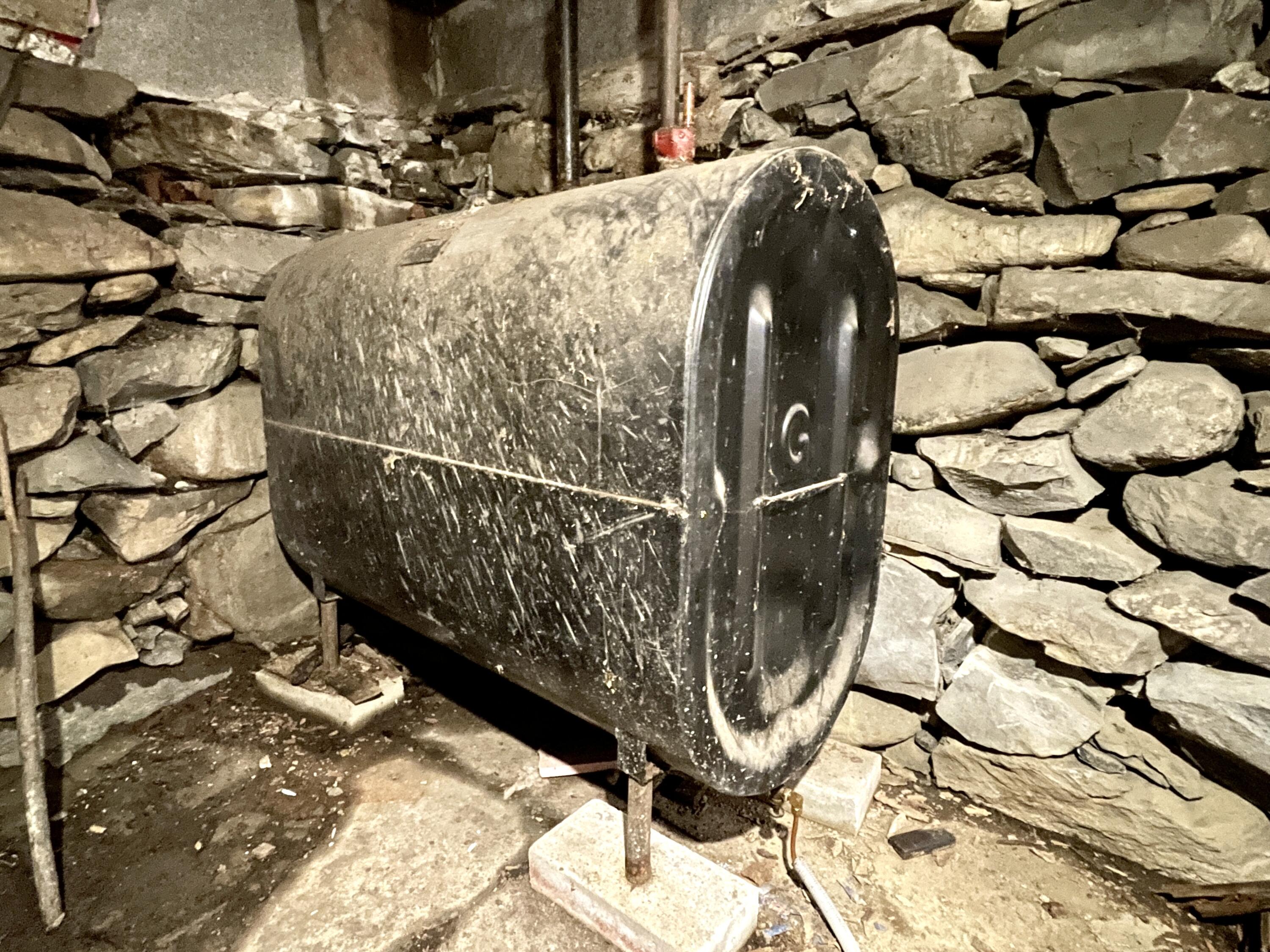 728 Sebec Village Road Sebec, ME 04481 - Photo 54 of 59 Oil tank