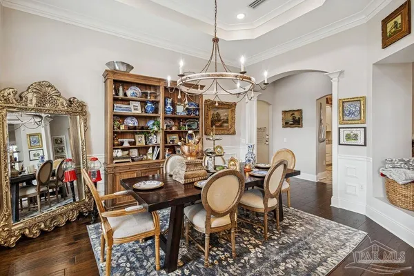 a bathroom with a sink a mirror and a shower
