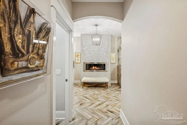a view of a bedroom with a window and storage