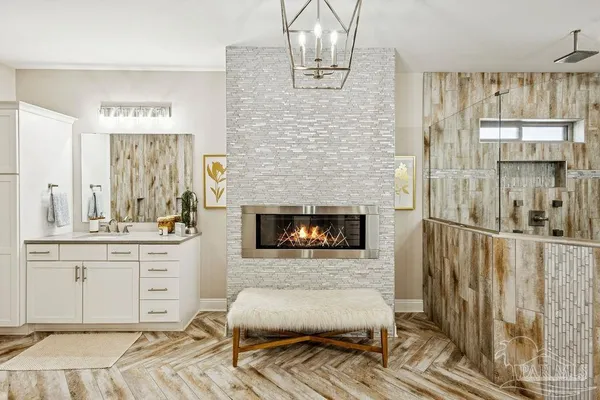 a bathroom with a sink a mirror and a toilet