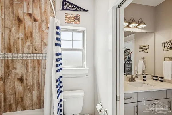 a view of a golf course with a lake