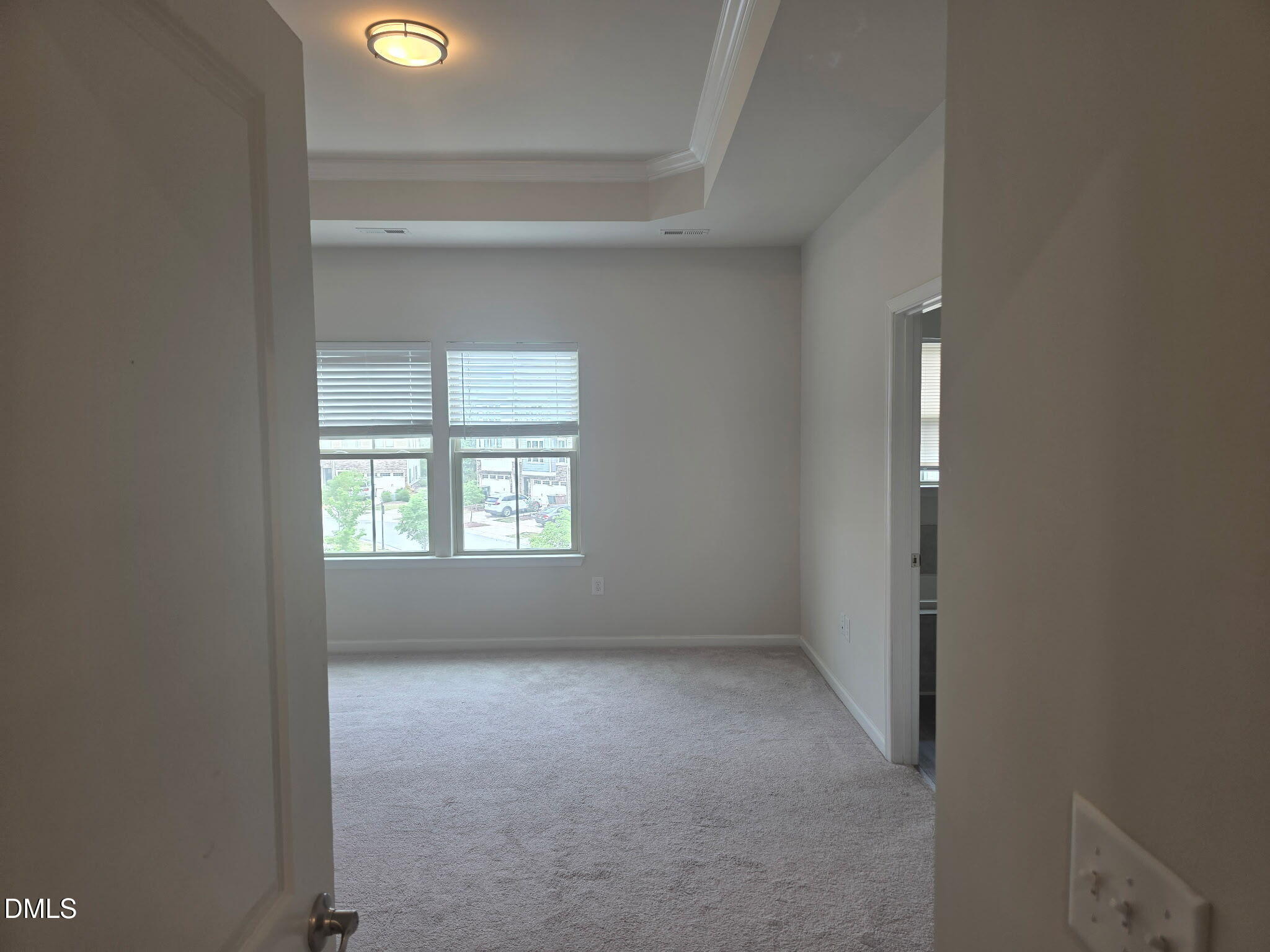 214 Timber Forest Lane Cary, NC 27519 - Photo 14 of 20 an empty room with a window
