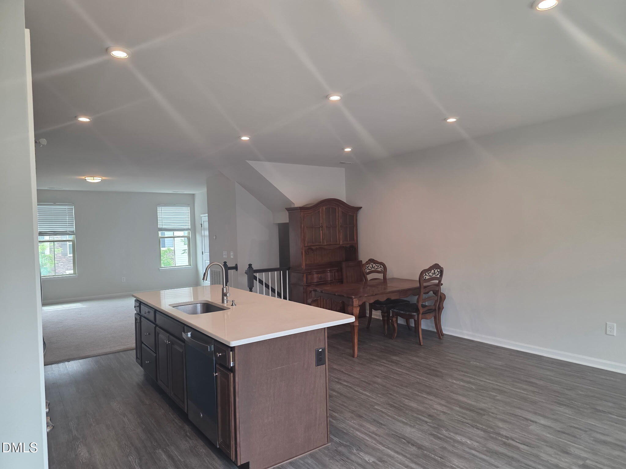 214 Timber Forest Lane Cary, NC 27519 - Photo 6 of 20 a kitchen with a sink and cabinets