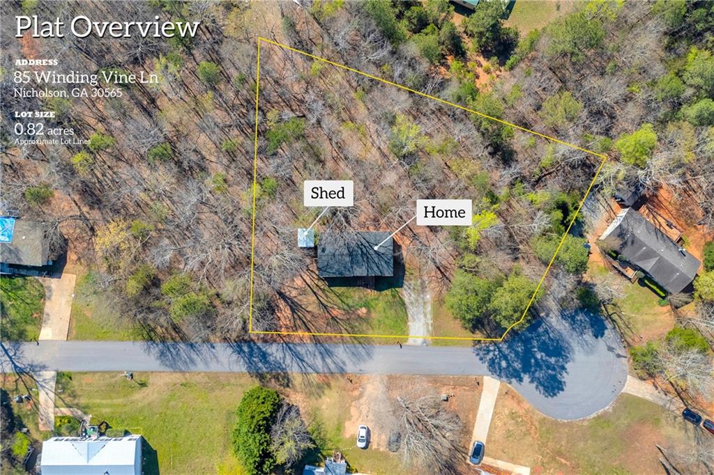 85 Winding Vine Lane Nicholson, GA 30565 - Photo 32 of 40 a sign that is sitting on a tree