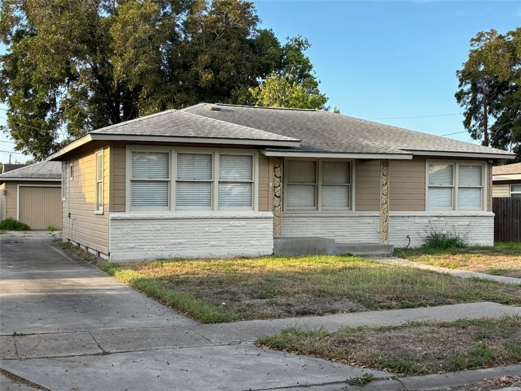 1010 Peerman Place Corpus Christi, TX 78411 - Photo 1 of 8 a front view of a house