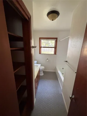 a bathroom with a toilet
