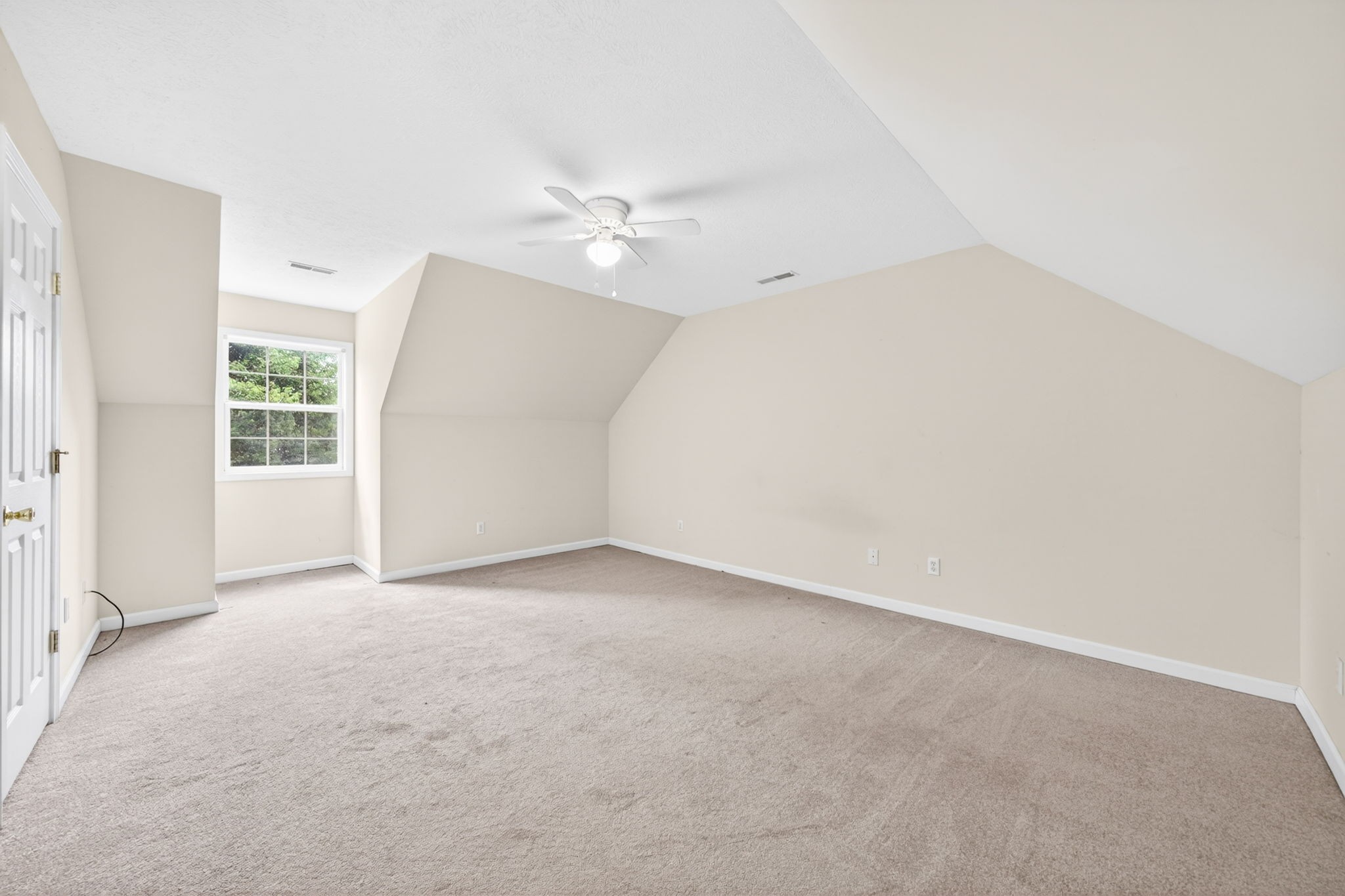 291 Poplar Point Lane Rickman, TN 38580 - Photo 21 of 41 an empty room with windows and fan
