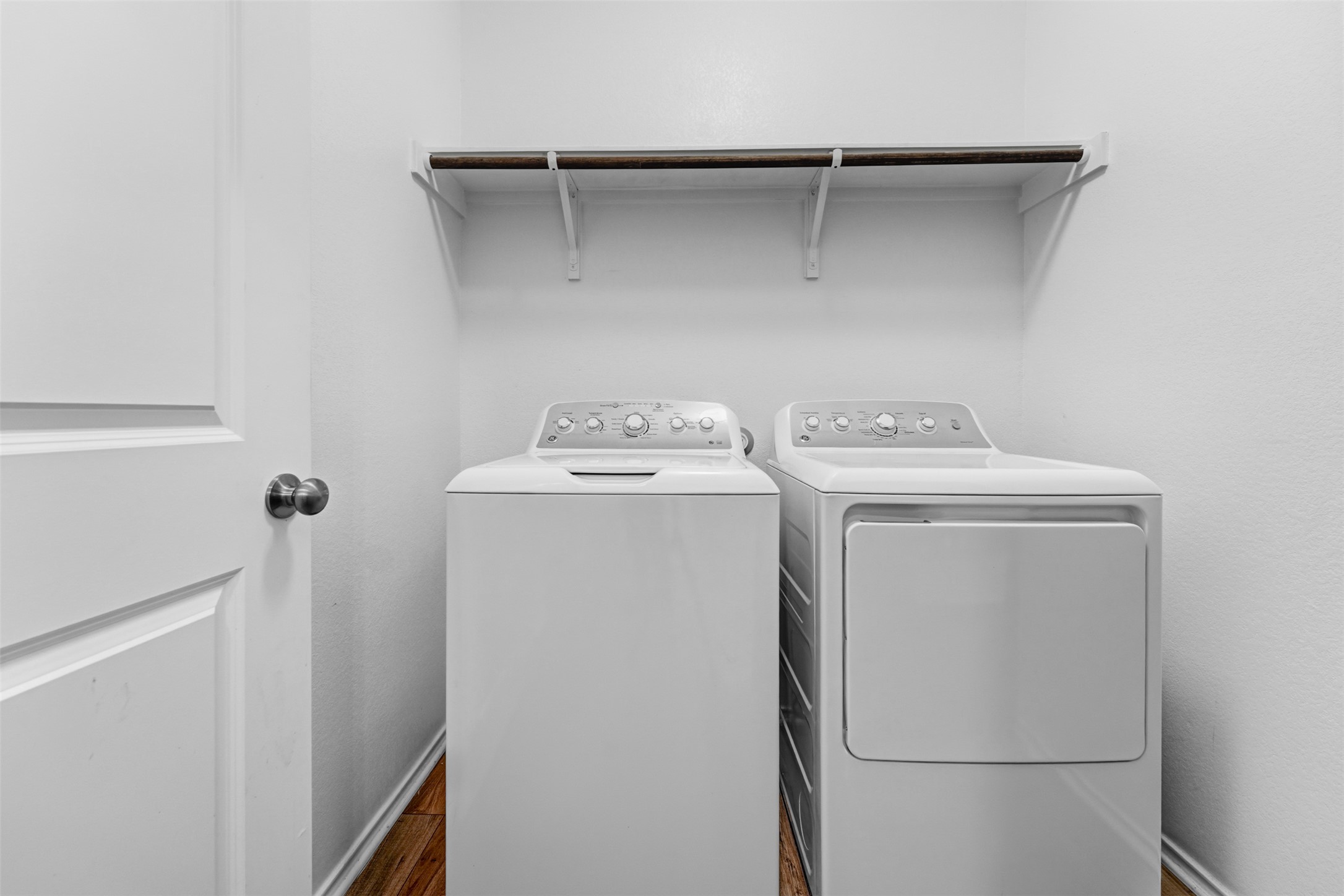413 Perfect World Loop Jarrell, TX 76537 - Photo 22 of 39 Functional laundry space featuring a practical shelf for organization.