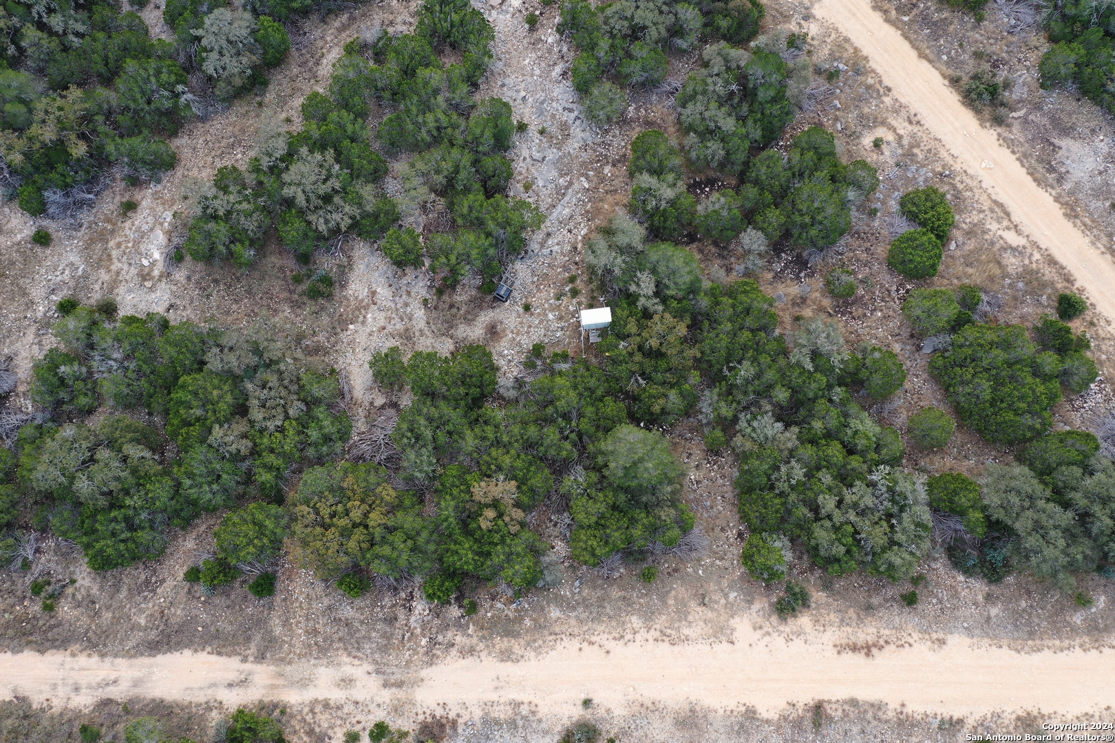 1048 Sd 46067 Del Rio, TX 78840 - Photo 14 of 23 an aerial view of a forest with houses