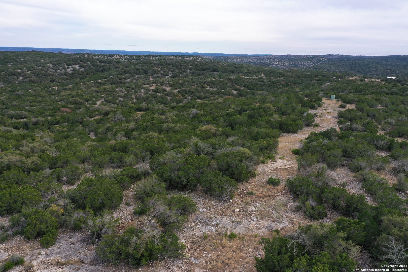 1048 Sd 46067 Del Rio, TX 78840 - Photo 20 of 23 an aerial view of residential houses with outdoor space and trees