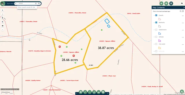 an aerial view of a forest with houses