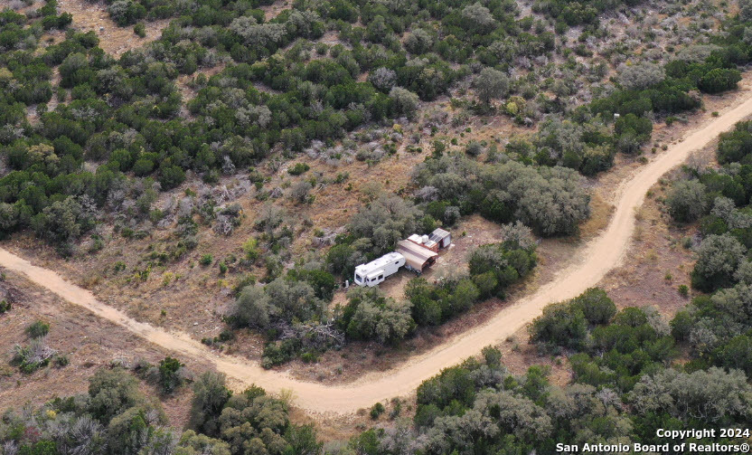 1048 Sd 46067 Del Rio, TX 78840 - Photo 3 of 23 an aerial view of a forest with houses