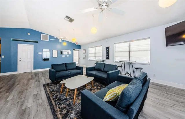 a view of a field with an ocean