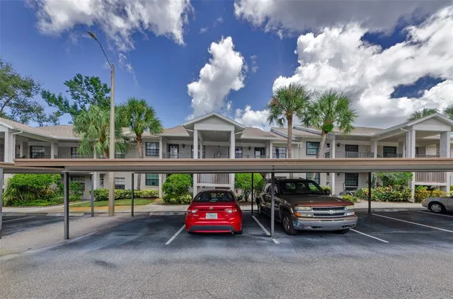 a porch with a bench in patio