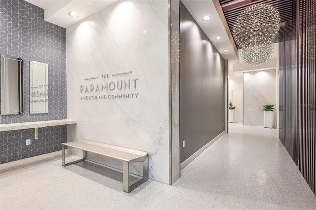 a spacious bathroom with a bathtub and shower