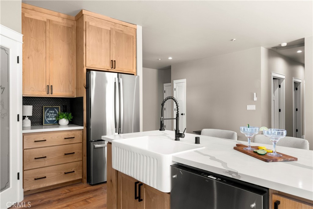5334 Filbert Street Paradise, CA 95969 - Photo 11 of 30 a kitchen with a sink refrigerator and cabinets