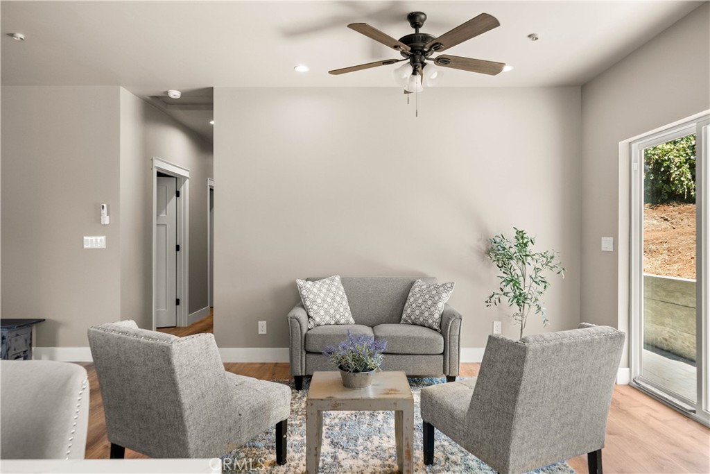 5334 Filbert Street Paradise, CA 95969 - Photo 13 of 30 a living room with furniture and a potted plant