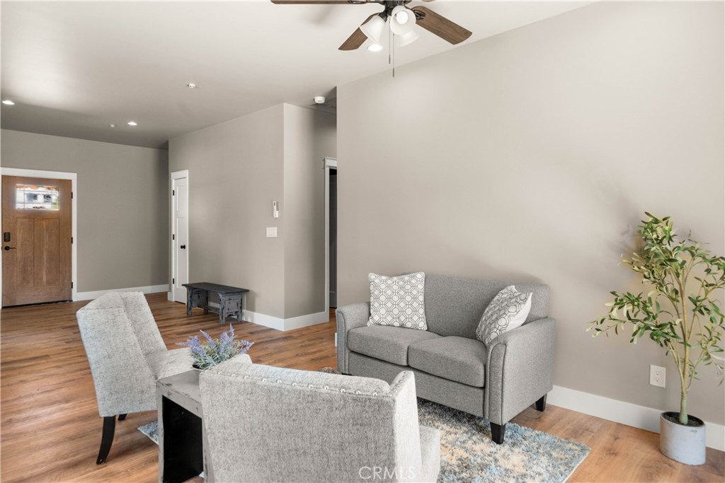 5334 Filbert Street Paradise, CA 95969 - Photo 14 of 30 a living room with furniture and a potted plant