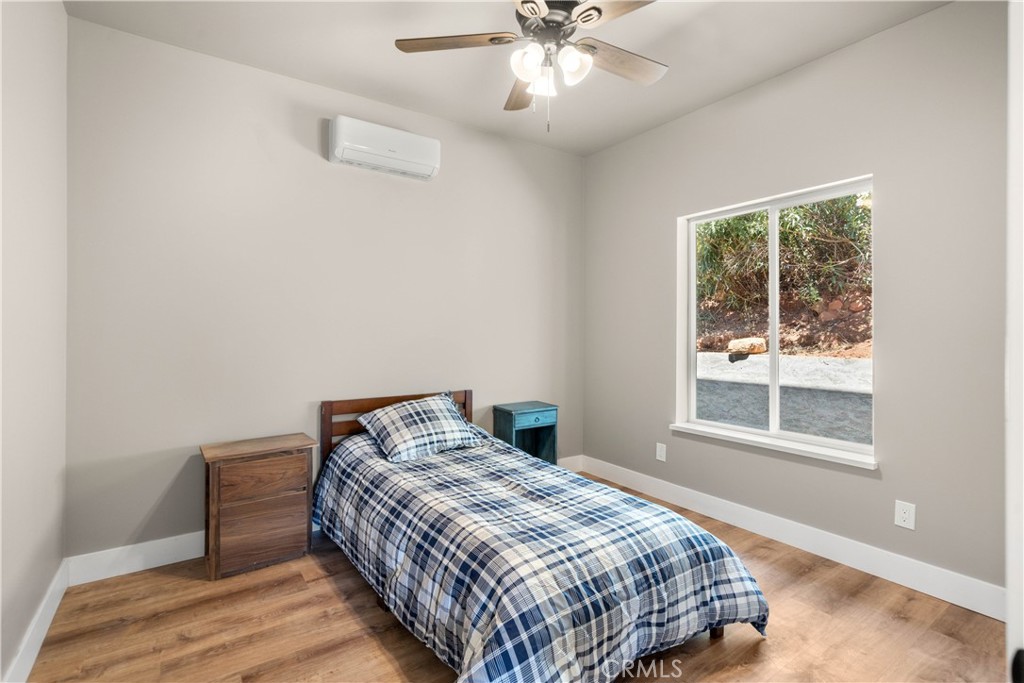 5334 Filbert Street Paradise, CA 95969 - Photo 19 of 30 a bedroom with a bed and a window