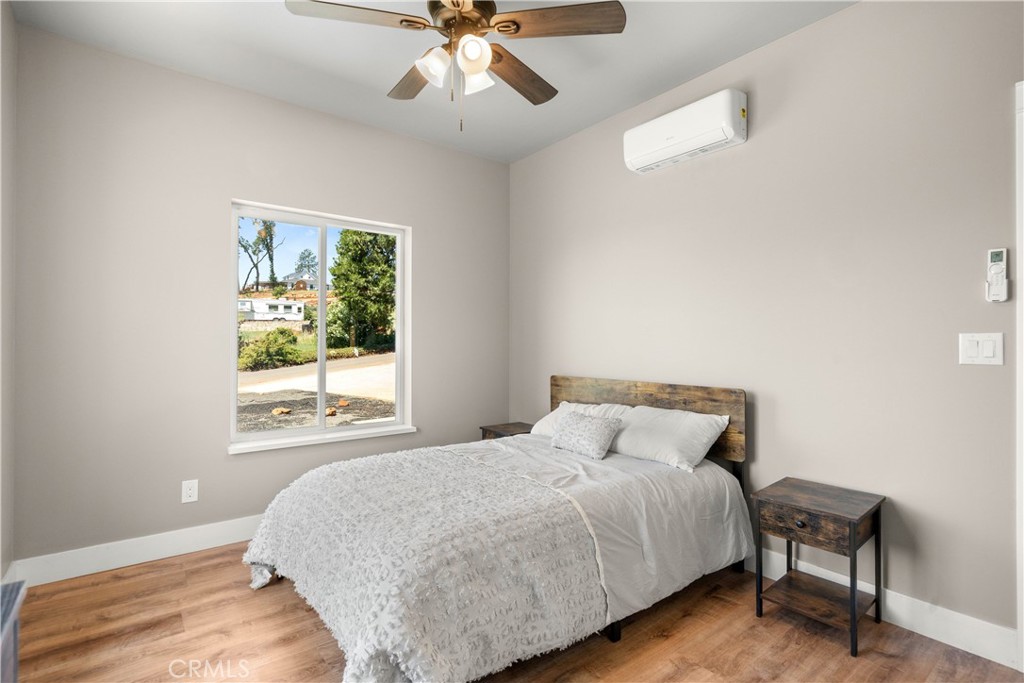 5334 Filbert Street Paradise, CA 95969 - Photo 21 of 30 a bedroom with a bed and a window