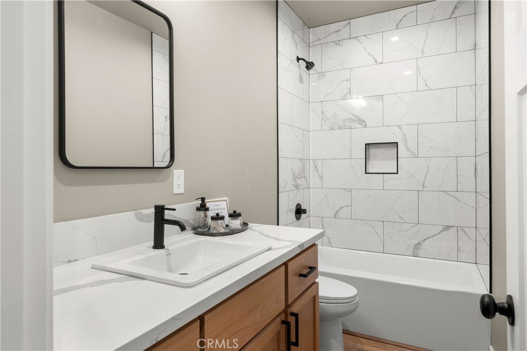 5334 Filbert Street Paradise, CA 95969 - Photo 23 of 30 a bathroom with a sink a toilet and shower