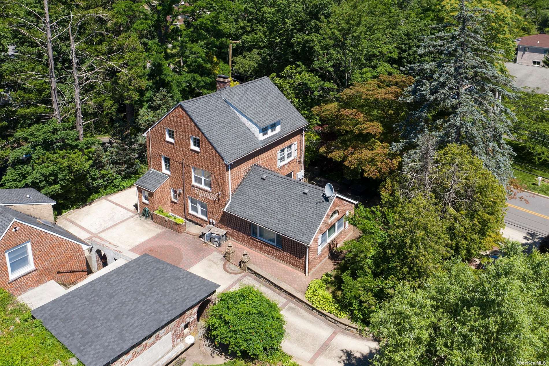 22 Redbrook Road Great Neck, NY 11024 - Photo 1 of 1 an aerial view of a house with a garden