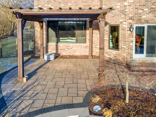 a view of swimming pool with a patio